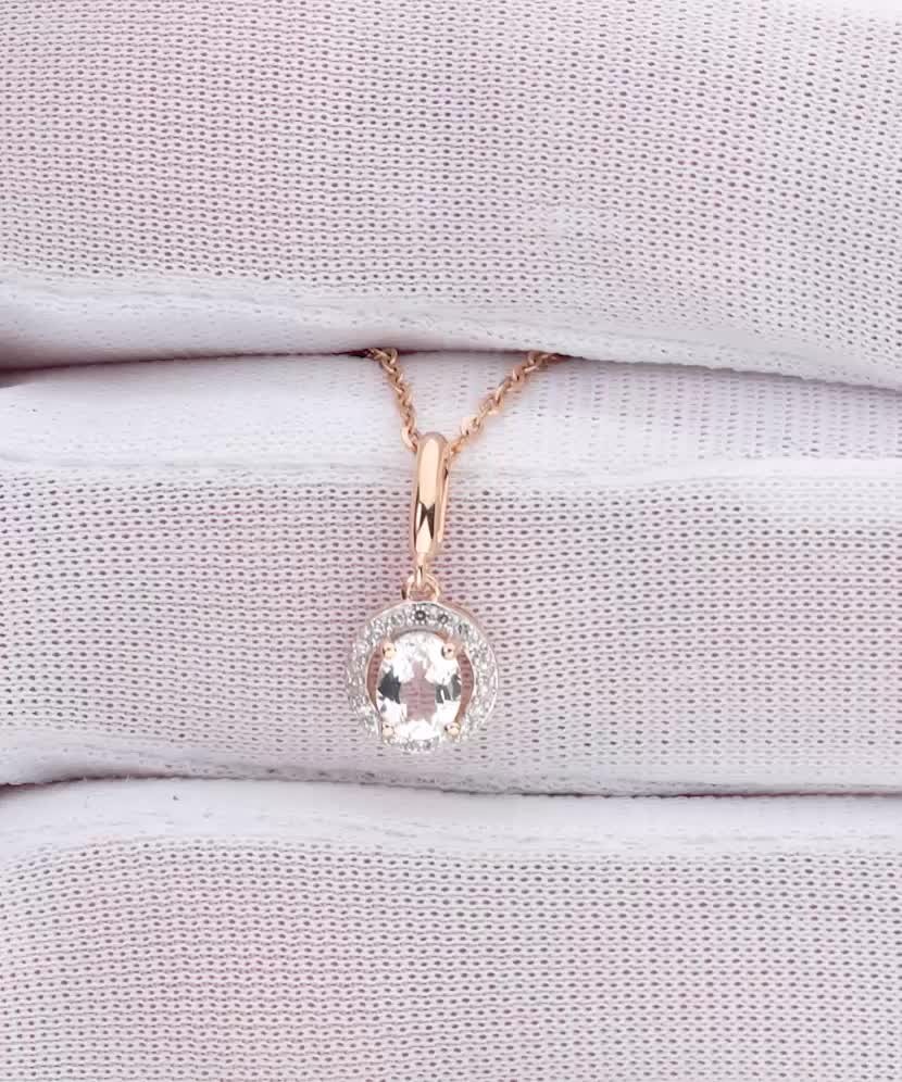 Kuldne ripats valge topaasi ja teemantidega