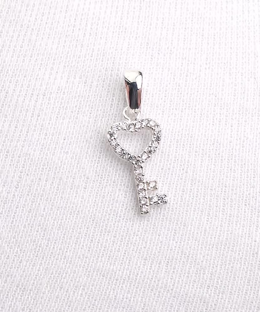 Hõbesõrmus tsirkoonidega "Võti" - Goldinga